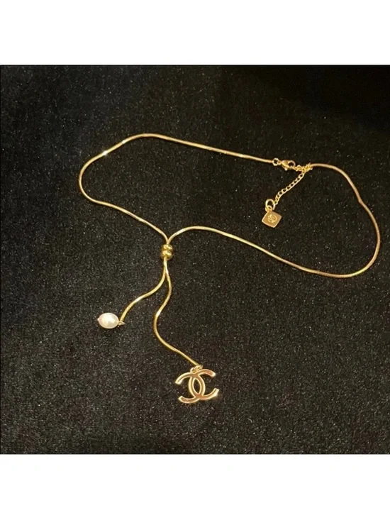 CHANEL Gold-Tone Lariat Necklace with Pearl and CC Charm - Picture 4 of 8